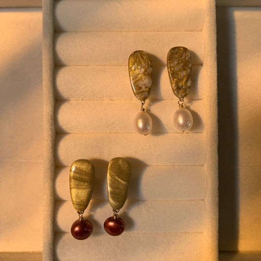Gold handmade polymer clay earrings with white and red pearls, using 14k gold-filled wire and 925 sterling silver post