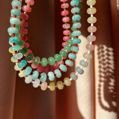 the whole collection of handbeaded necklace made using button shaped beads of  agate stones with tiny colorful glass beads. trending chunky beaded necklace for summer