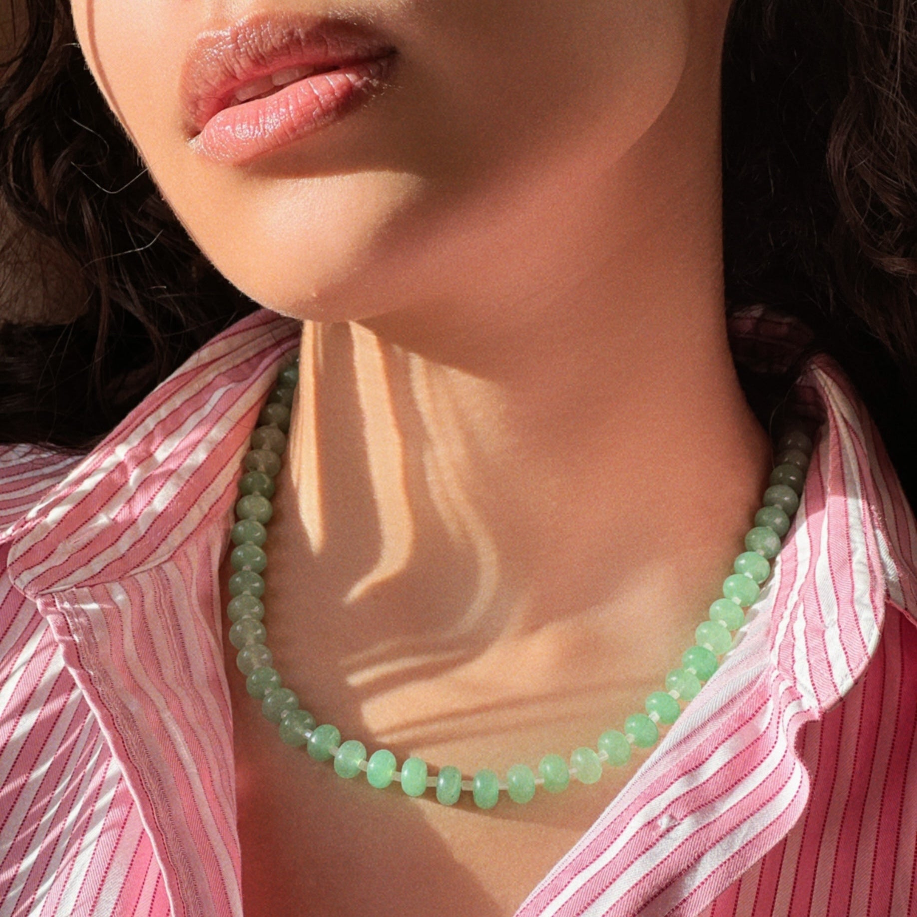 handmade necklace made using button shaped beads of green agate stones with tiny white cream glass beads. trending chunky beaded necklace for summer - white cream and green color combo
