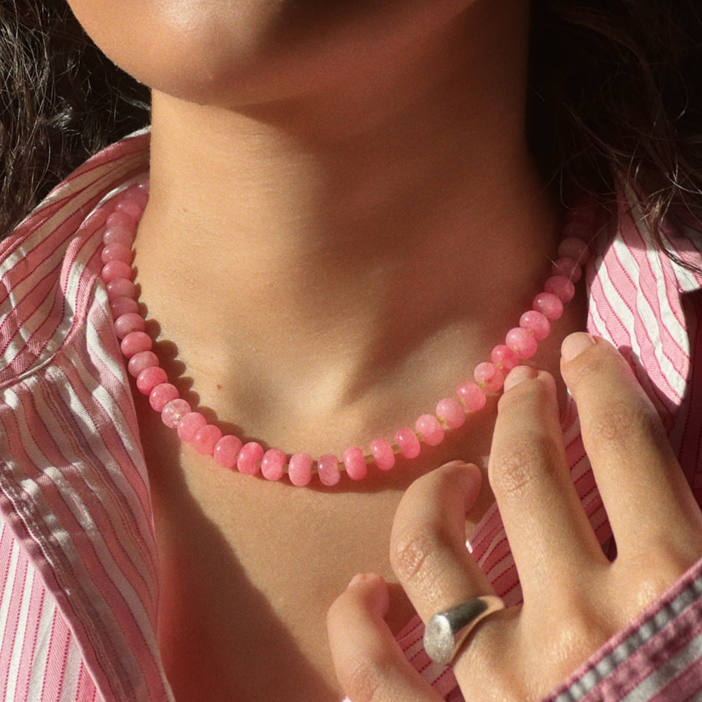 handmade necklace made using button shaped beads of pink agate stones with tiny green glass beads. trending chunky beaded necklace for summer - pink and  green color combo